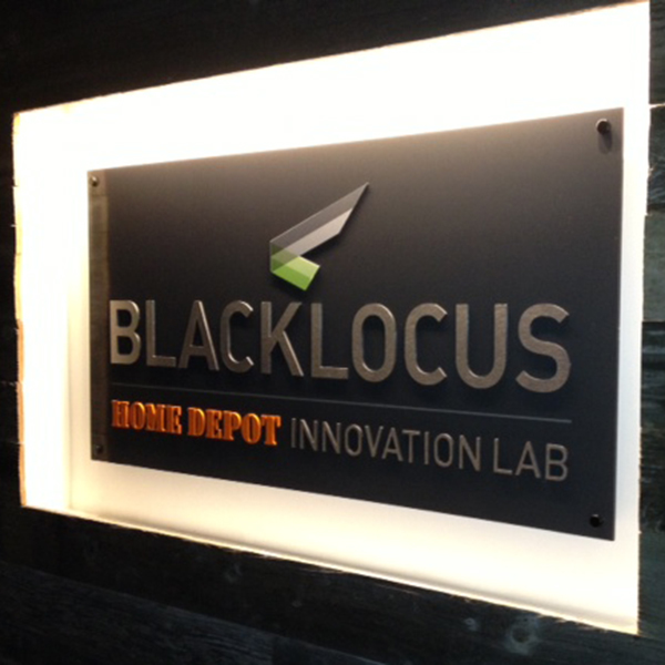 Black Locus lobby sign