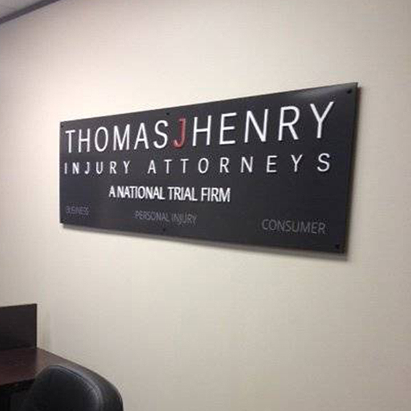 Thomas J Henry lobby sign