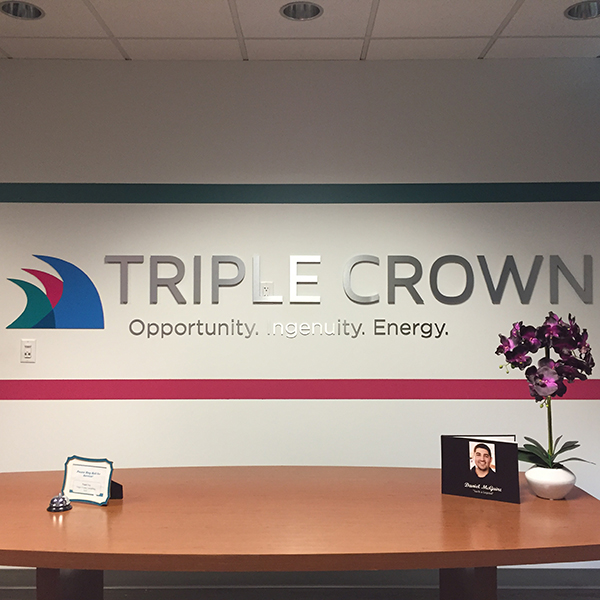 Triple Crown lobby sign