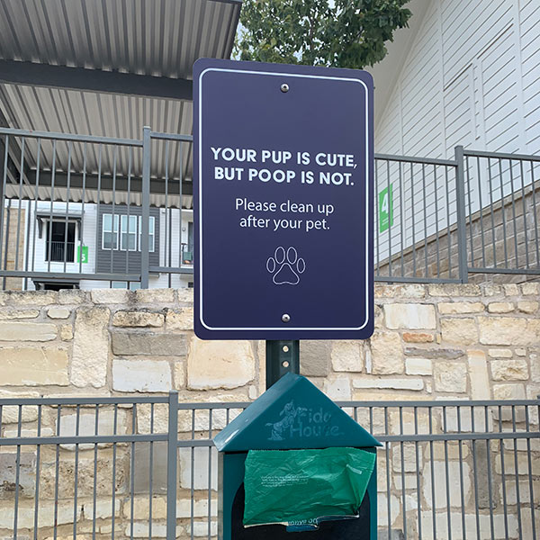 Clean up after your pet outdoor sign