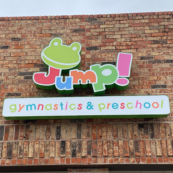 Jump Gymnastics Storefront Sign